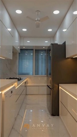 Clean lines. Smart storage. Timeless elegance. ✨This modern kitchen