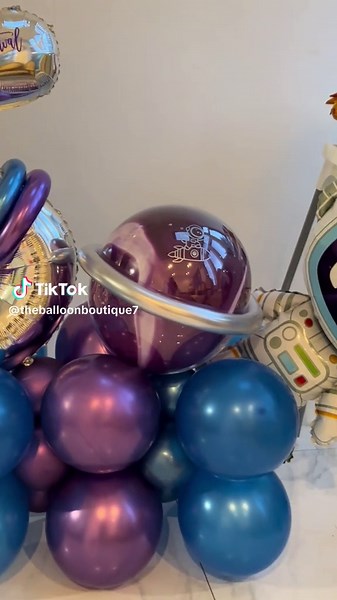 Space-Themed Balloon Stack for Birthday Celebration