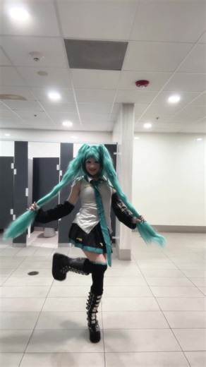 Miku passing by: A Cute Cosplay Moment