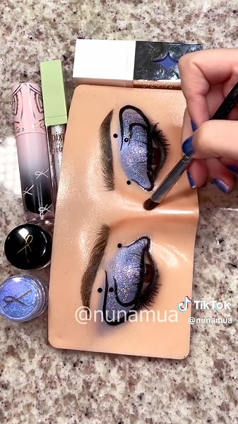 Have had this look sketched for AGESS and hadn’t been able to create it (till now, lol) but I wanted to go for some mystical-witchy vibes to kind of fit the season Products used: @Half Magic Liquid eye paint in “Sky juice” @Glamlite Ice cream palette @Karla Cosmetics “Eclipse” shadow potion paint (black paint used) “lazy bones” loose multichrome “glass slipper” loose glitter Code: NUNAMUA10 for a discount 💜✨ @Pixi Beauty Crystalline liquid glitter for the inner corner #eyeshadow #eyemakeup #cre