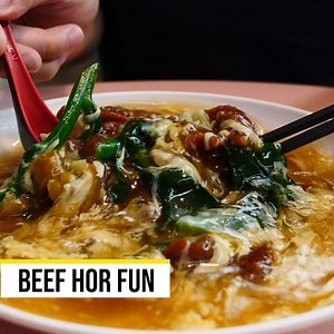 The signature Beef Hor Fun comprises of beautifully charred hor fun, six slices of beef and a few stalks of kai lan miao swimming in a magnificent and silky eggy gravy. Read more: https://www.misstamchiak.com/hor-fun-premium/ | Miss Tam Chiak