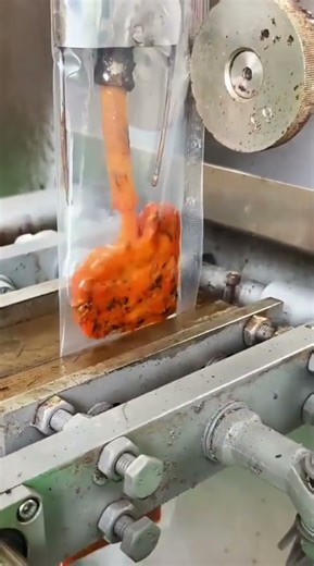 the filling stage of a product in plastic using sophisticated tools in the factory#tools