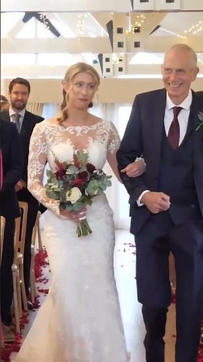 Bride walks down the aisle