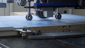 clip-1069957315-sawmill-machine-cutting-mdf-parts-manufacture-elements
