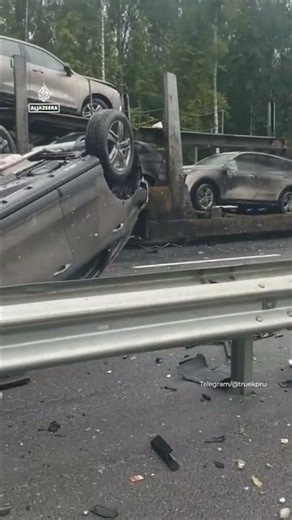 Video shows a truck carrying liquefied carbon dioxide crashing into a car carrier and exploding