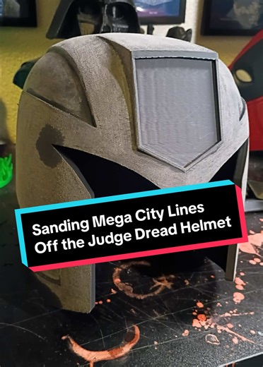 From print lines to screen-ready 🔥 Sanding a 3D printed 2012 Judge Dredd helmet until it’s worthy of Mega-City One 👮‍♂️⚖️ #JudgeDredd #Sanding #CosplayProcess #DIYProps #helmetbuild