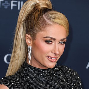 Paris Hilton Flaunts Her Toned Legs In A Chic Mini Dress For Mugler Runway Show As Fans Mock Her ‘Awkward’ Walk