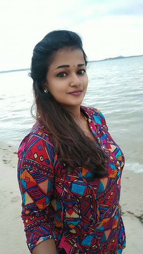 Stunning Beach Fashion Showcase with Colorful Dress