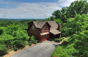 t's All about you when it comes to the beautiful 3 Bedroom Gameroom Cabin 97. Featuring breathtaking views, fireplace, hot tub, gas grill and much more. Give us a call at 1-800-652-2611 for the best available rates and current availability. https://www.oakhavenresort.com/3-bedroom-cabins/cabin-97/ | Oak Haven Resort