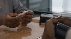 Payment Transaction with Protective Screen | Free Stock Video Footage