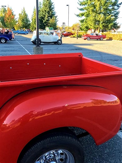 In 1951, America was cruising into a new era of style and strength, and the red Chevy truck you see here was born to lead the charge. This is the Chevrolet Advance Design, a legend that rolled off the assembly line with bold curves and a rugged heart. Powered by a 216-cubic-inch Thriftmaster inline-six engine, it delivered 90 horsepower, enough to haul heavy loads through post-war boomtowns. Its iconic chrome grille and split windshield screamed confidence, while the vibrant red paint—straight f