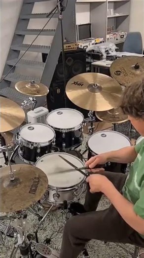 Drumming along the jazzy fusion in 'Devotion' by Skinny Hightower