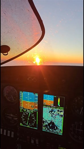Probably the best view for a sunset, from an aeroplane.