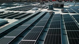 Drone Flight Fly Over Solar Panels Renewable Green Alternative Energy on the Roof