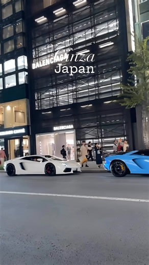 Ginza is a famous upscale shopping district in Tokyo, Japan, known for its luxury boutiques, department stores, and fine dining. It's a vibrant area that blends modern architecture with traditional elements, featuring everything from high-end fashion brands to art galleries. The streets are often bustling with pedestrians, especially on weekends when they become pedestrian-only zones. Ginza also hosts various cultural attractions, including theaters and museums, making it a popular destination f