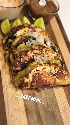 Leftover slow cooked chicken thighs crispy tacos, paired w/beans & sour cream + cholula.