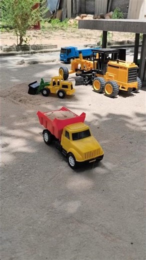 Caçamba e pá carregadeira | Dump truck and front-end loader
