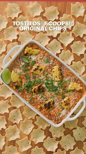 #ad Game day, movie night, or a last-minute get-together; set out Tostitos Scoops! paired with this cheesy, crunchy Mexican street corn dip for a match made in snack heaven. 😋 Grab a bag for your next party: www.tostitos.com | Tastemade