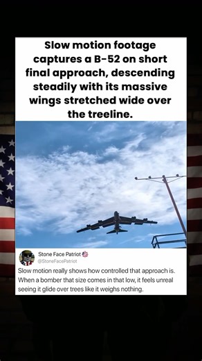 Slow motion footage captures a B-52 on short final approach, descending steadily with its