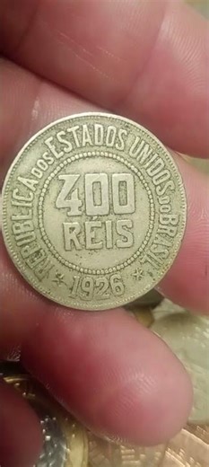 old 100-year-old Réis coin, time has passed.