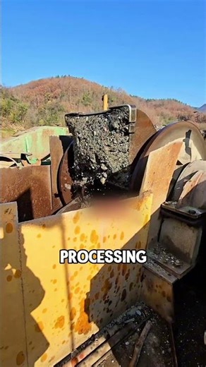A Floating Gold Mine Machine Working the Riverbed with Continuous Dredging and Onboard Processing