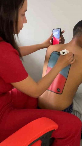 Tattoo artist pranks client with realistic phone lock screen tattoo