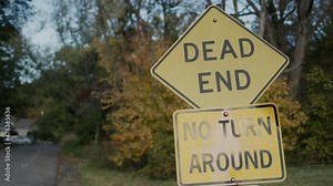 Dead end sign and No turn Aroundon a country road near the forest, where the entrance to the residential area. NY, USA
