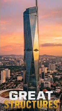 HOW DID THEY LIFT A 555 FOOT SPIRE TO THE TOP OF THE MERDEKA 118 😱 #megaprojects #engineering