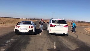 3.2K views · 75 reactions | The 011's famous X5m taking on the Nissan GTR What a fantastic race between the two cars #011STREETSOCIETY #racewarz #streetracing #mpower #gtr | 011 Street Society | Facebook