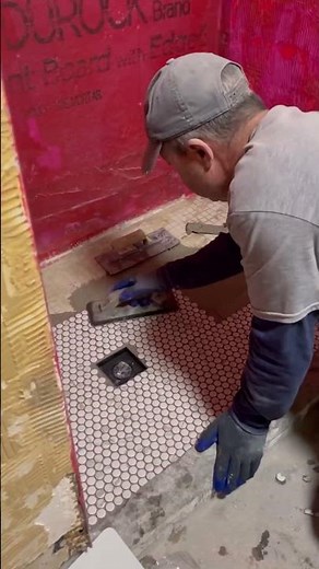 Installing penny tile on a shower floor
