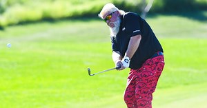 John Daly makes insane one-handed chip in while holding beer in other hand