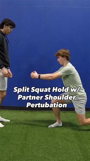 Split Squat Hold with Partner Shoulder Perturbation is an advanced stability and strength exercise that challenges your lower-body strength, core stability, and upper-body control under dynamic conditions. Here’s a breakdown of its benefits 👇 1. Lower-body strength and endurance * The split squat hold (essentially an isometric lunge) targets the quads, glutes, and hamstrings, while also demanding endurance from these muscles as you hold the position. * Builds joint stability in the knees, hips,