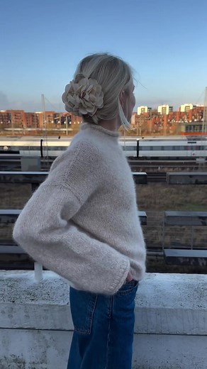 Create your own stylish and cozy Cloud Sweater with our top-down knitting pattern! Begin with the back yoke, shaping shoulders with short rows, and then knit each shoulder separately for a perfect fit. Join them to form the front yoke, and seamlessly connect the front and back at the underarms to craft the body. Sleeves are effortlessly added from picked-up stitches around the armholes and knitted in the round for a smooth finish. Complete your sweater with a chic stockinette stitch funnel neckl