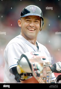 Washington, D.C. - July 7, 2005 --  New York Mets 2nd baseman Miguel Cairo (3) smiles as he steps to the plate during the action against  the Washington Nationals at RFK Stadium in Washington, D.C. on July 7, 2005.  The Mets secured a come-from-behind 3 -2 victory in 11 innings. Credit: Ron Sachs / CNP Stock Photo - Alamy