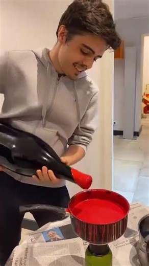 Waxing a huge bottle of wine.🍷@domainedelodylee #jeroboam #wine #bottle #waxing