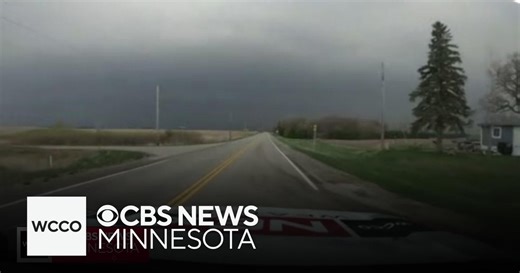Dark storm clouds, hail move in during live weather report south of Minneapolis
