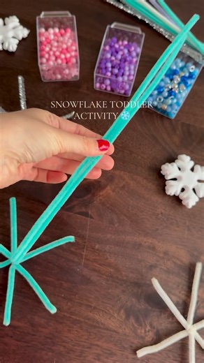 Beading snowflakes for tiny hands ❄️ So simple but so fun and she loved choosing every single bead herself 💕 #toddleractivities #finemotorskills #toddlerfun #easykidscrafts #creativekids | What a Mom Needs