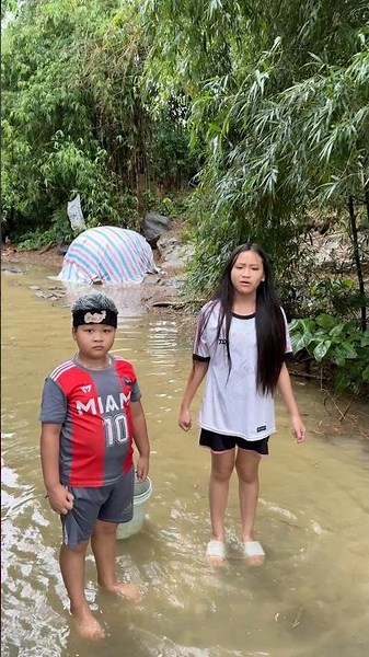 It’s raining and the roads are flooded… called my dad, he told me to grab a broom to bail out the...
