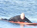 Jonah Hill heads out for a solo surfing session with new surfboard in Malibu