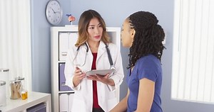 Japanese Doctor Taking Notes Talking African Stock Footage Video (100% Royalty-free) 7006285 | Shutterstock