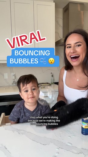 Make BOUNCING BUBBLES 🫧‼️ with science 🧬 Full details below👇🏼. 👉🏼Follow @sarahahabibi for more STEM activities at home! 📚Pre-Order my STEAM Activity book NOW for more in-depth activities like this📚 Link in bio! ✅SAVE to try it yourself! Materials: 🧼 2 tablespoons sugar 🧼 4 tablespoons hot water 🧼 1 tablespoon dish soap 🧼 Bubble wands 🧼 Gloves Mix the sugar into hot water until it dissolves. Add the dish soap. Put on your gloves and gently blow a bubble onto your hand. ✨The SCIENCE ✨