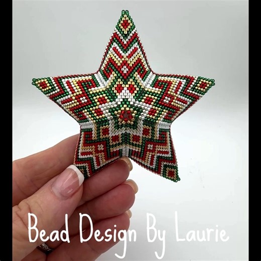 Laurie Gary on Instagram: "Such a fun Christmas peyote stitched beaded star ornament. I enjoyed designing and making this star ornament. Pattern comes with complete instructions and a word chart. https://beaddesignbylaurie.etsy.com/listing/1219909975/christmas-beaded-3d-peyote-star-digital #beading #bead #beadwork #peyotestar #peyotestitch #seedbeads #delicabeads"