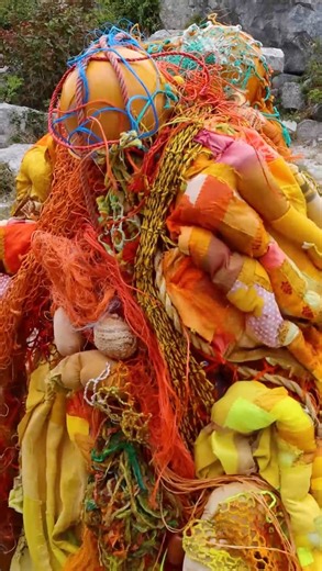 Fiona Campbell on Instagram: "My piece Riot is now installed on the rocks at Tout Quarry Sculpture Park & Nature Reserve, as part of @oneislandmanyvisions . We had a lovely opening last weekend. I’ll be activating Riot as an intervention, in collaboration with @melart55 this Sunday 14 Sept, 2pm at its site (📍what3words: ///deliver.press.tilts) It will be more of a happening than performance. Do come if you can. We will be there no matter the weather! Bring a brolly ;-) See full description of R