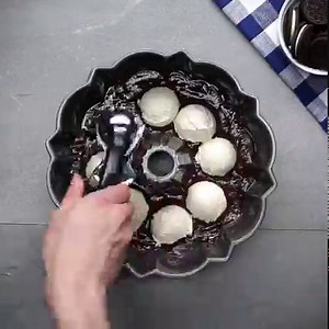 This bundt cake is glazed with chocolate and stuffed with cheesecake! | Tasty