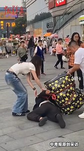 28K views · 552 reactions | A passerby carrying a heavy backpack suddenly collapsed on the street. One by one, kind-hearted citizens rushed to help, turning crisis into safety. ❤️ #ChinaStory | China News 中国新闻网 | Facebook