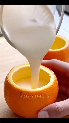 This homemade orange ice cream is smooth, citrusy, and seriously refreshing. Like a creamsicle, but better. 🍊 Ingredients - 3 fresh oranges - ⅓ cup whipping cream (100 mL) - 1½ tablespoons white sugar (20 g) Instructions: 1. Slice off the tops of the oranges, just enough to scoop out the flesh. Blend the flesh until smooth, then strain to extract the juice. You’ll need about 100 ml. Set the hollowed peels aside for serving. 2. Stir the sugar into the cream until fully dissolved and slightly thi