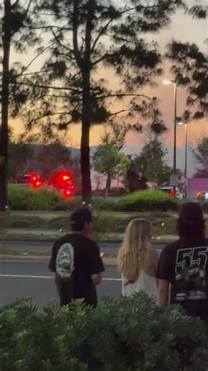 San Diego fire department fire helicopter handles SANTEE fire behind the Walmart town center area!