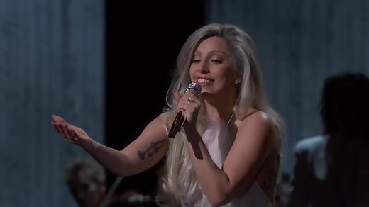 799K views · 10K reactions | Lady Gaga - The Sound Of Music, Tribute to Julie Andrews at the 87th Oscars Awards. After this performance Lady Gaga was considered a vocalist and not just a popstar, the media spent months sharing about her talent with previous performances and description of her rise from a girl with a dream to an Oscar performer while the " grey hair " became an huge trend. | Monster Nation, PAWS UP | Facebook