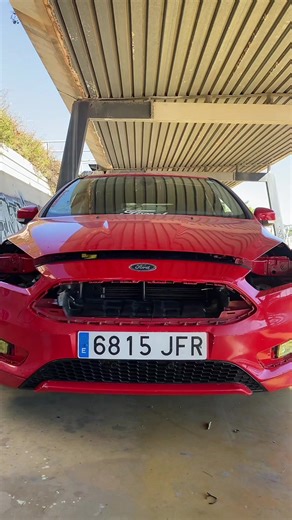 Explore the Details of a Red Ford Car