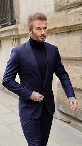 #DavidBeckham looked incredibly sharp in a fitted navy suit as he attended the #Boss Milan Womenswear fashion show in #Italy last week. 📷: Getty Images | The Australian Women's Weekly